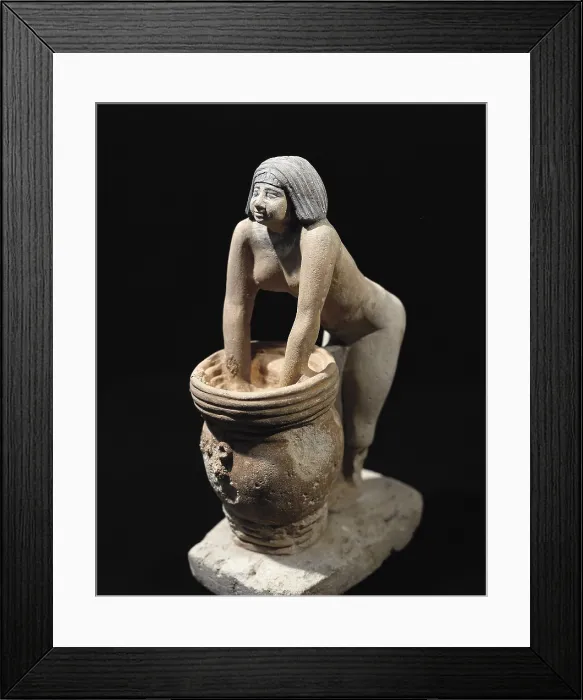 Framed Print : Woman making beer. ca. 2465 BC. Servant preparing beer. Egyptian art. Old Kingdom. Terra-cotta. EGYPT. Cairo. Egyptian Museum. Proc: EGYPT. Saqqara