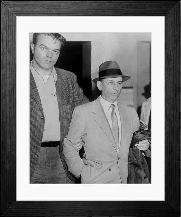 Framed Print : Gambling boss Meyer Lansky (1902-1983), led by a detective for booking on vagrancy charge at 54th Street police station, New York City, February 13, 1958