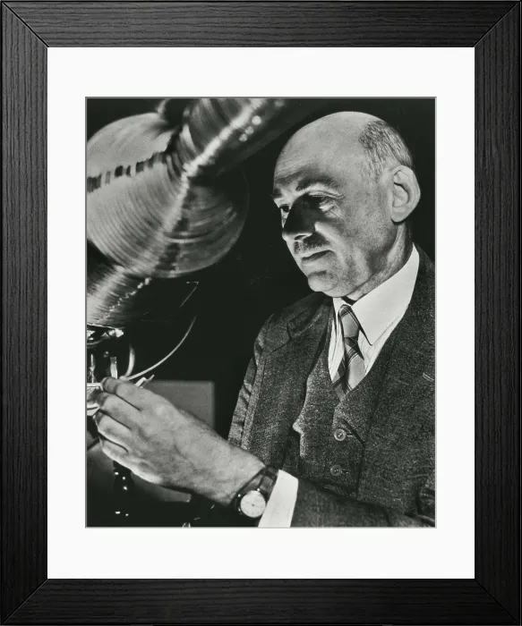 Framed Print : GODDARD, Robert Hutchings (1882-1945). Goddar making adjustments in a combustion rocket. AISA / Everett Collection**US SALES ONLY**