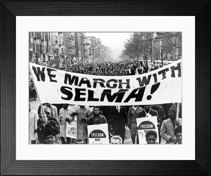 Framed Print : Civil Rights, Marchers carrying banner 'We march with Selma!' on street in Harlem, New York City. Photo by Stanley Wolfson, 1965