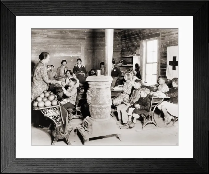 Framed Print : Students in a one-room school near Sunflower, Mississippi receive grapefruit from Red Cross disaster relief during the 1930-31 drought that devastated the regions agriculture