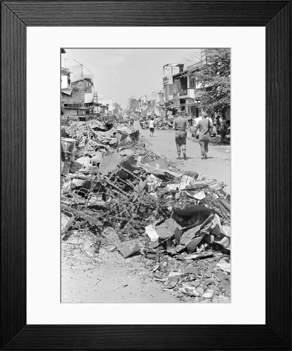 Framed Print : Vietnam War, Saigon, Vietnam, rubble and the remains of barbed wire line the streets of Cholon Framed Print : Vietnam War, Saigon, Vietnam, rubble and the remains of barbed wire line the streets of Cholon