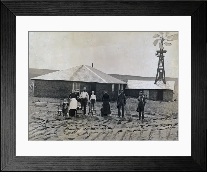 Framed Print : A farm family standing in front of sod house and windmill. Coburg, Nebraska 1885
