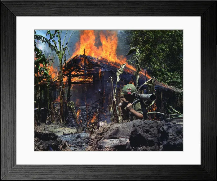 Framed Print : Vietnam War, My Tho, a Viet Cong base camp. In the foreground: Private First Class Raymond Rumpa, St