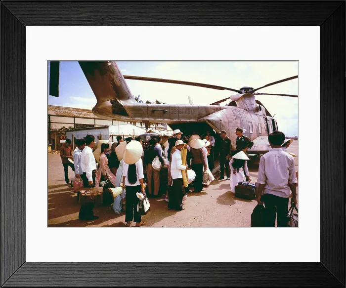 Framed Print : Vietnam War, South Vietnamese villagers board an Air Force CH-3C helicopter for evacuation to another village as U.S