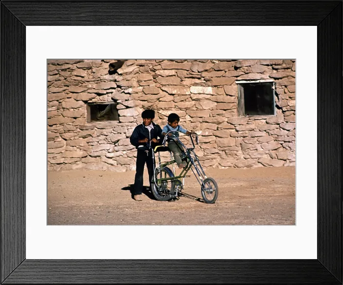 Framed Print : Native American reservation. Two Hopi boys with a bicycle. Hopi Reservation, Arizona ca. 1973