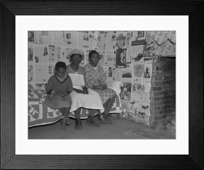 Framed Print : African American mother with her two daughters living in primitive conditions as plantation tenants in Gees Bend, Alabama