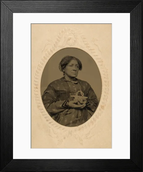 Framed Print : Well dressed middle aged, African American women holding a basket in the Post Civil War era. Ca. 1870 Framed Print : Well dressed middle aged, African American women holding a basket in the Post Civil War era. Ca. 1870