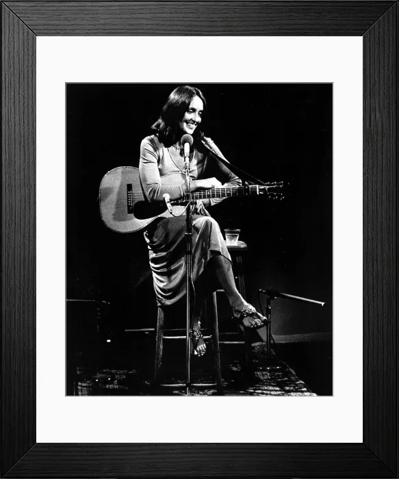 Framed Print : Joan Baez relaxes between songs during her special public television concert AN HOUR WITH JOAN BAEZ (TV, 1974). Courtesy: CSU Archives / Everett Collection Framed Print : Joan Baez relaxes between songs during her special public television concert AN HOUR WITH JOAN BAEZ (TV, 1974). Courtesy: CSU Archives / Everett Collection