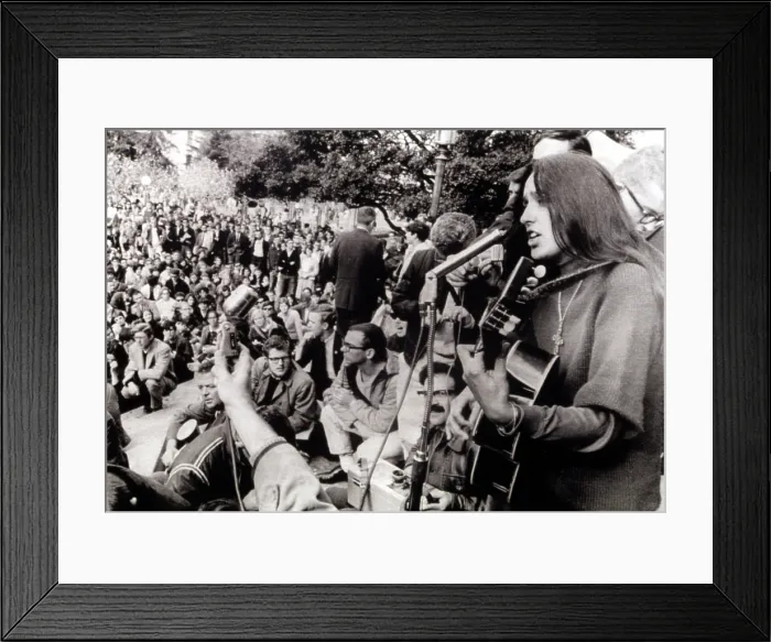 Framed Print : 12-2-64 BERKELEY, CALIf.: Folk singer Joan Baez strums her guitar and sings freedom songs during a sit-in at the University of California at Berkeley Framed Print : 12-2-64 BERKELEY, CALIf.: Folk singer Joan Baez strums her guitar and sings freedom songs during a sit-in at the University of California at Berkeley