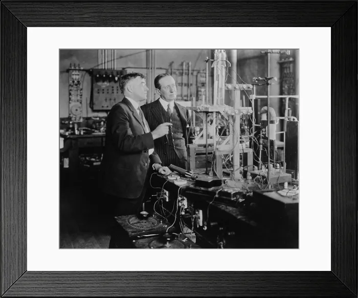 Framed Print : Irving Langmuir (1881-1957) with Guglielmo Marconi (1874-1937), Nobel Prize winners, possibly in Langmuir's General Electric Chemistry laboratory