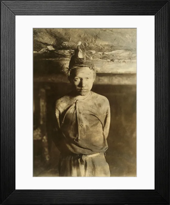Framed Print : A Trapper Boy, whose job was to wait in the dark mine, opening and closing a door connecting one mine chamber to another, allowing coal cars to pass through Framed Print : A Trapper Boy, whose job was to wait in the dark mine, opening and closing a door connecting one mine chamber to another, allowing coal cars to pass through