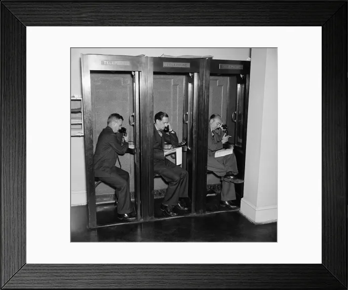 Framed Print : Reporters in telephone booths in White House press room, ca. 1937 Framed Print : Reporters in telephone booths in White House press room, ca. 1937