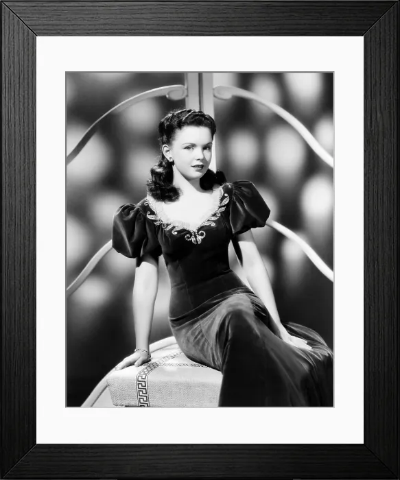 Framed Print : GET HEP TO LOVE, Gloria Jean, in a blue velveteen sub-deb gown with gold embroidery, by Vera West, 1942 Framed Print : GET HEP TO LOVE, Gloria Jean, in a blue velveteen sub-deb gown with gold embroidery, by Vera West, 1942