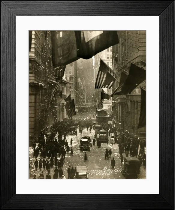 Framed Print : Old Glory. Flags wave over Wall Street, New York City in celebration of the surrender of Germany and the end of the Great War. W.L. Drummond, photographer, Dec 5, 1918 Framed Print : Old Glory. Flags wave over Wall Street, New York City in celebration of the surrender of Germany and the end of the Great War. W.L. Drummond, photographer, Dec 5, 1918