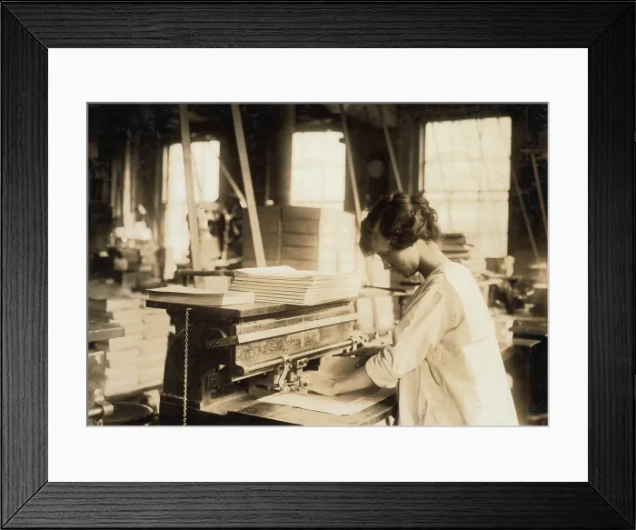 Framed Print : Child Labor, 15-year old girl punching sheets, Boston Index Card Company, Boston, Massachusetts, Massachusetts, photograph by Lewis Wickes Hine, January 31, 1917 Framed Print : Child Labor, 15-year old girl punching sheets, Boston Index Card Company, Boston, Massachusetts, Massachusetts, photograph by Lewis Wickes Hine, January 31, 1917