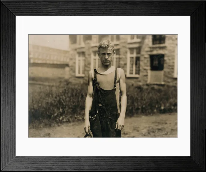 Framed Print : Portrait of a doffer, Marian Viera, of 101 Columbia Street, says he gets $7.74 a week, Fall River, Massachusetts, photograph by Lewis Wickes Hine, June 20, 1916