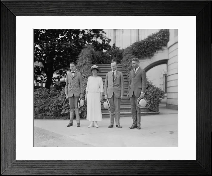 Framed Print : President Calvin Coolidge (1872-33) with his wife and two sons Calvin Jr. (on left) and John, in September 1923. Calvin Jr. would die the following summer Framed Print : President Calvin Coolidge (1872-33) with his wife and two sons Calvin Jr. (on left) and John, in September 1923. Calvin Jr. would die the following summer
