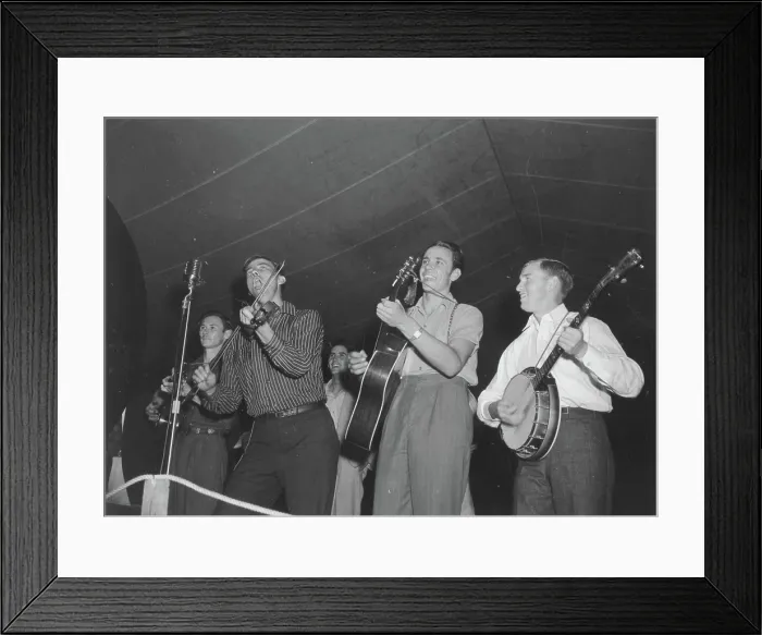 Framed Print : Four musicians performing at the Mountain Musical Festival, Asheville, North Carolina, circa 1930s-1940s Framed Print : Four musicians performing at the Mountain Musical Festival, Asheville, North Carolina, circa 1930s-1940s