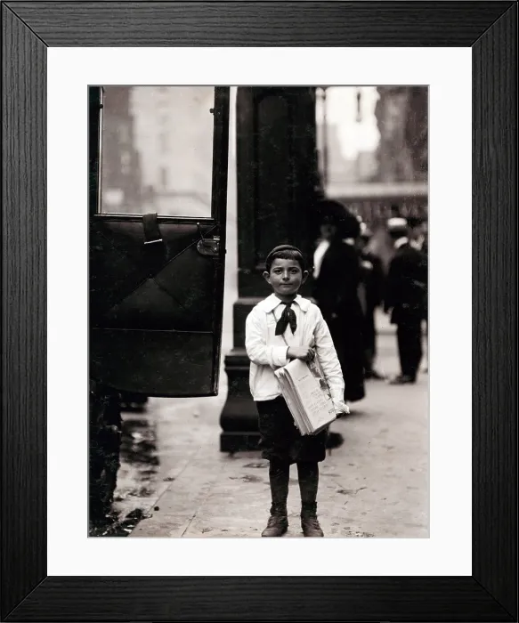 Framed Print : Newsboy, from original caption: Dominick Carroll, 8 years old (appears 6). Newsboy. Sells from 3 P.M. to 7 P.M. income 25 cents per day