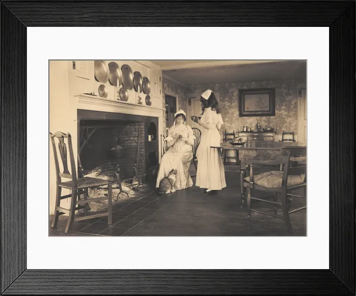Framed Print : Recreation of a gentile colonial American house with two women in colonial costume. 1913 photo by Wallace Nutting