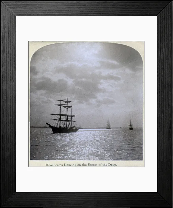 Framed Print : Moonbeams dancing on the bosom of the deep'. Stereograph showing moonlight on water, and sailing ships at anchor, ca. 1895