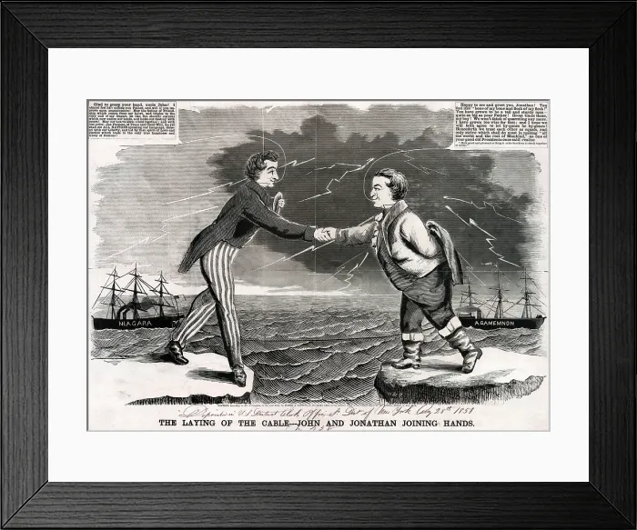 Framed Print : Telegraph. Woodcut of the first transatlantic telegraphic message between the United States and Great Britain. Uncle Sam and John Bull shake hands across the sea. 1858
