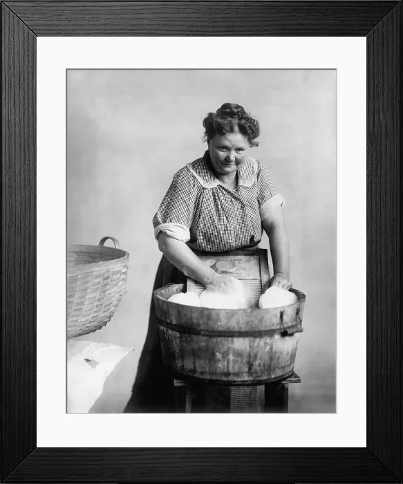 Framed Print : Woman doing laundry in wooden tub and metal washboard, ca. 1905