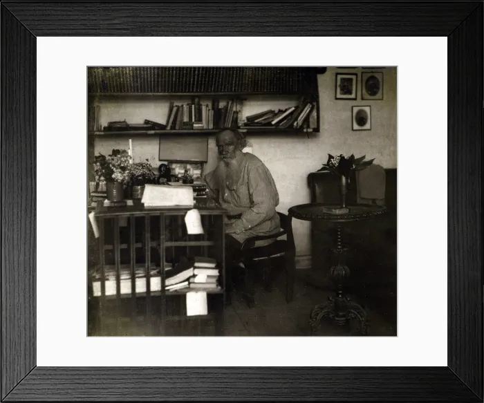 Framed Print : Leo Tolstoy (1828-1910) Russian novelist, writing in his study at the Tolstoy estate in Iasnaia Poliana, 1908