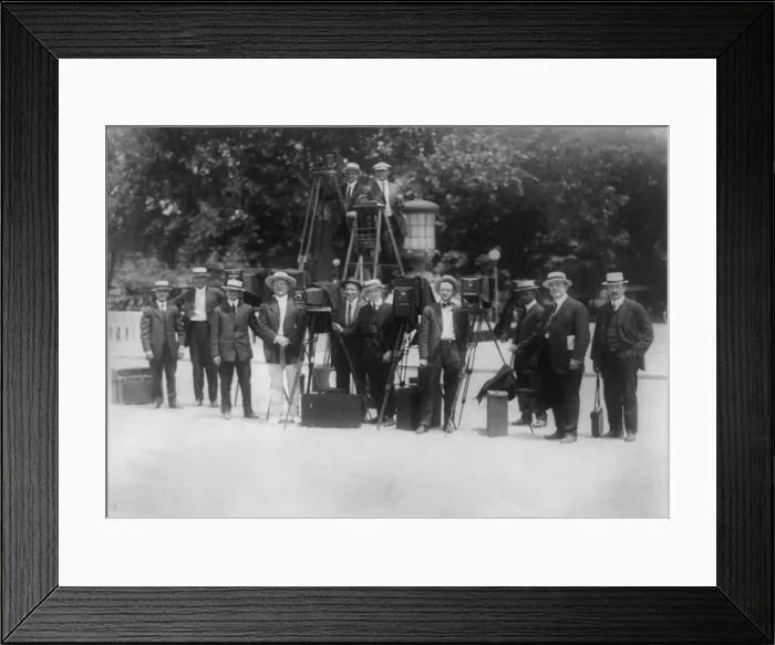 Framed Print : News photographers posing with cameras, circa 1909-1932