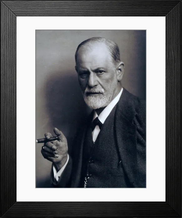 Framed Print : Sigmund Freud (1856-1939) smoking cigar in a classic early 1920s portrait Framed Print : Sigmund Freud (1856-1939) smoking cigar in a classic early 1920s portrait