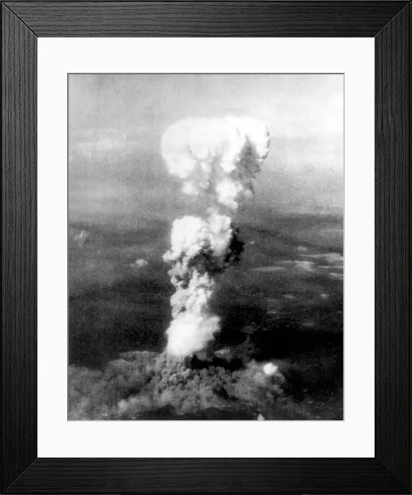 Framed Print : Atomic bomb. A mushroom cloud rises more than 20, 000 feet into the air over Hiroshima, Japan after an atomic bomb was dropped by the US bomber 'Enola Gay', Aug. 6, 1945