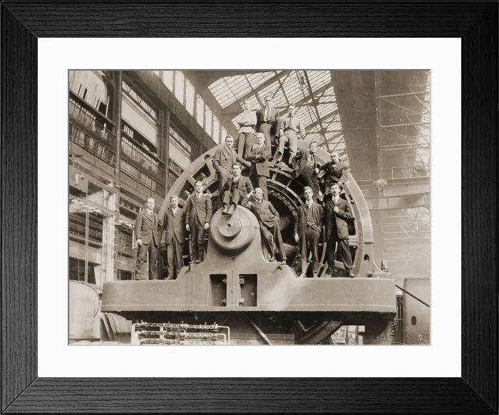 Framed Print : Businessmen pose on a giant Westinghouse electrical generator in Pittsburgh, Pennsylvania, 1918
