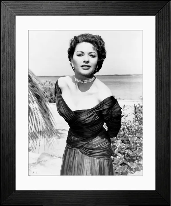 Framed Print : Yvonne De Carlo, on location in Nassau, where she is filming FLAME OF THE ISLANDS, 1955