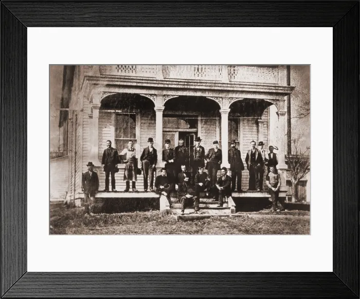 Framed Print : Thomas Edison with the engineers and technicians of his Menlo Mark workshop. Edison is under the central arch, leaning against the support with his hands in his pockets. Ca. 1880 Framed Print : Thomas Edison with the engineers and technicians of his Menlo Mark workshop. Edison is under the central arch, leaning against the support with his hands in his pockets. Ca. 1880
