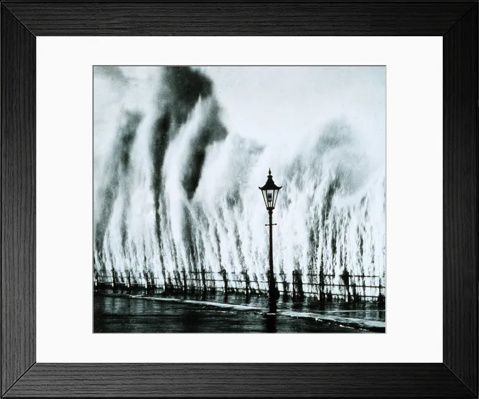 Framed Print : New England Hurricane. Waves striking a seawall on th New England coast give the appearance of geysers erupting. September 1938