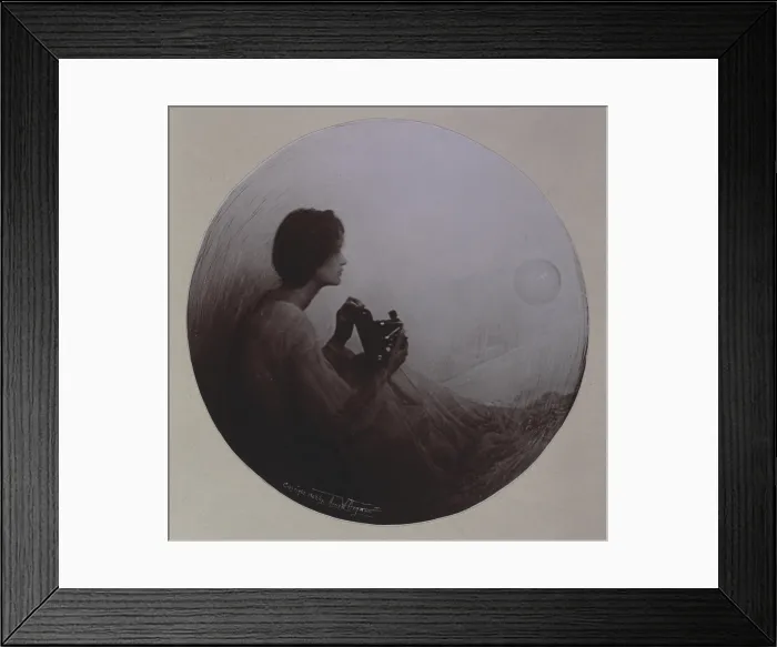 Framed Print : Woman seated with Kodak camera, in roundel, photograph by Anne Brigman, circa 1908