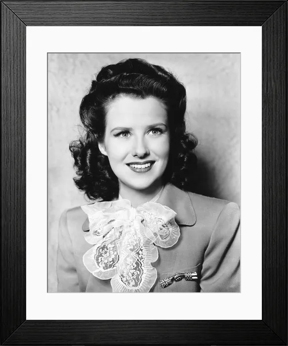 Framed Print : OBLIGING YOUNG LADY, Ruth Warrick, wearing a patriotic brooch of America and Britain shaking hands, 1942