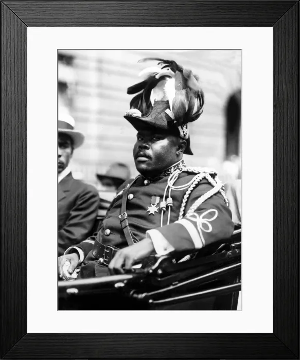 Framed Print : Marcus Garvey, the Negro Moses, rides through the streets of Harlem, New York City, amid delegates resplendent in plummage and golden braid. August 1922