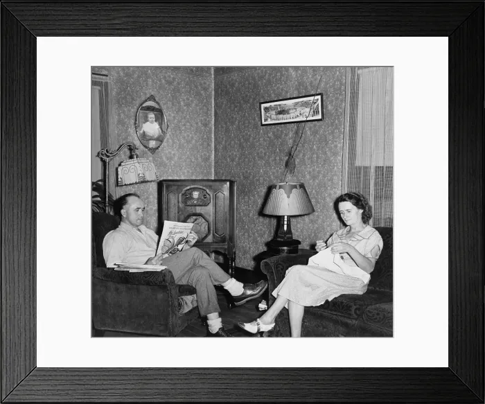 Framed Print : The comfortable living room of the home of a West Virginia coal miner and his wife, features a radio and electric lights, allowing for pleasant evenings in 1938