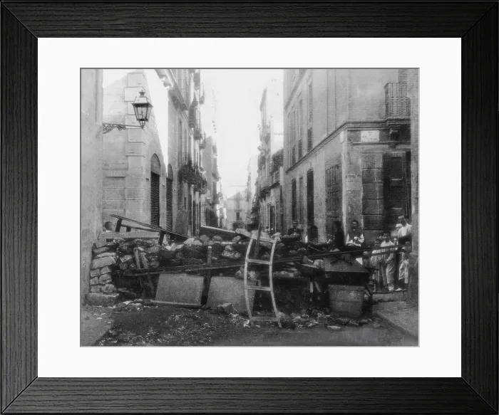 Framed Print : SPAIN. Barcelona. Spain (1909). Tragic Week in Barcelona. Barricades on the Ros de Olano street. AISA / Everett Collection**US SALES ONLY** Framed Print : SPAIN. Barcelona. Spain (1909). Tragic Week in Barcelona. Barricades on the Ros de Olano street. AISA / Everett Collection**US SALES ONLY**
