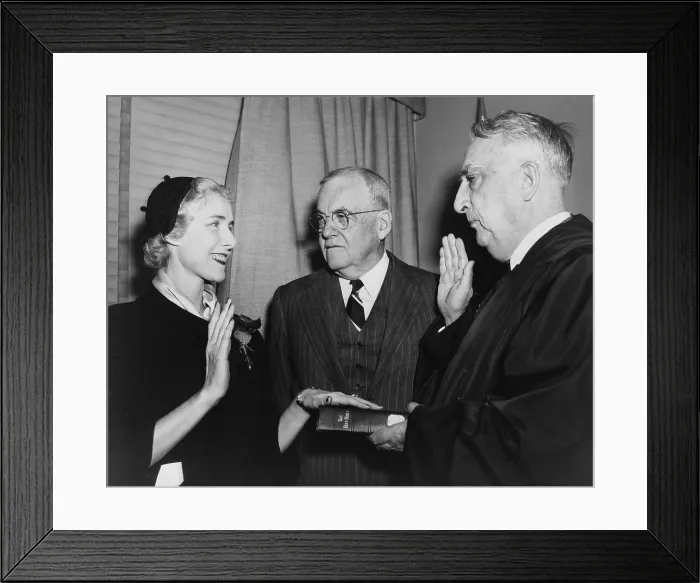 Framed Print : Clare Boothe Luce (1903-1987) being sworn in as Ambassador to Italy by Chief Justice Fred M. Vinson (right) as Secretary of State John Foster Dulles (center) looks on. 1953