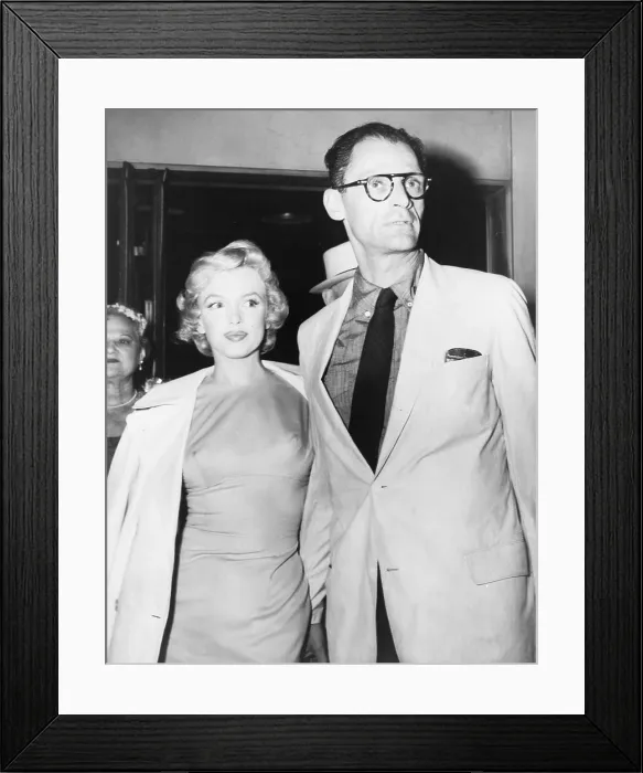 Framed Print : Marilyn Monroe and her new husband, playwright Arthur Miller leave her New York for London in 1956, for her to film THE PRINCE AND THE SHOWGIRL
