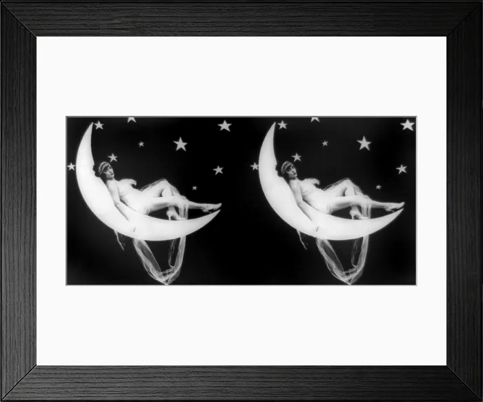 Framed Print : The Girl in the Moon, stereo view of a scantily clad woman laying back in a crescent moon, 1923 Framed Print : The Girl in the Moon, stereo view of a scantily clad woman laying back in a crescent moon, 1923