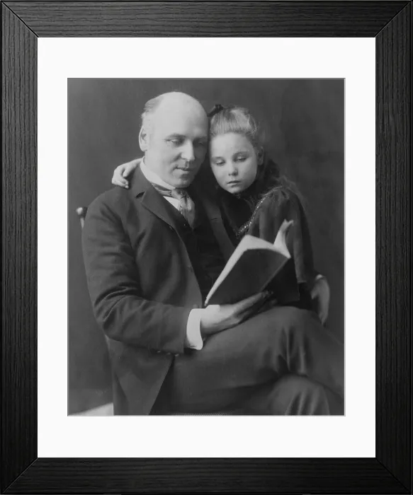 Framed Print : Howard Pyle (1853-1911) American writer, painter, and illustrator looking at book with his daughter Phoebe. 1897 Framed Print : Howard Pyle (1853-1911) American writer, painter, and illustrator looking at book with his daughter Phoebe. 1897