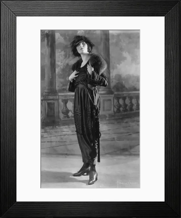 Framed Print : Woman modeling dress, a frock of Moon Glo Satin, photograph 1919 Framed Print : Woman modeling dress, a frock of Moon Glo Satin, photograph 1919