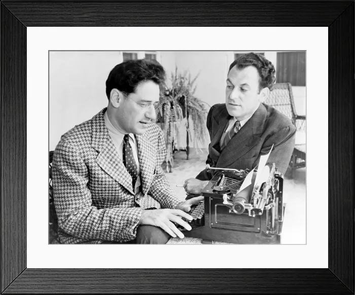 Framed Print : George S. Kaufman (1889-1961) typing while Moss Hart (1904-1961) talks, in 1937, the year their play, YOU CAN'T TAKE IT WITH YOU, won the Pulitzer Prize Framed Print : George S. Kaufman (1889-1961) typing while Moss Hart (1904-1961) talks, in 1937, the year their play, YOU CAN'T TAKE IT WITH YOU, won the Pulitzer Prize