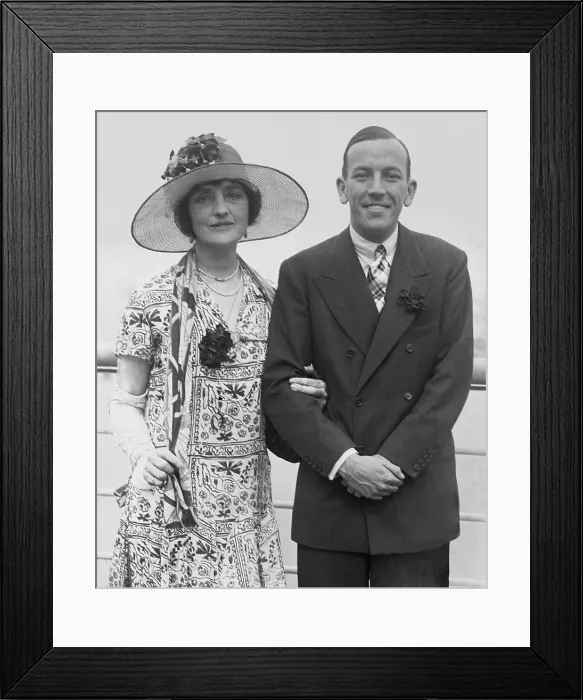 Framed Print : Noel Coward (1899-1973) and Lillian Braithwaite (1873-1948) arrive in NYC in 1925 for the American tour of 'The Vortex, ' Coward's, first great success
