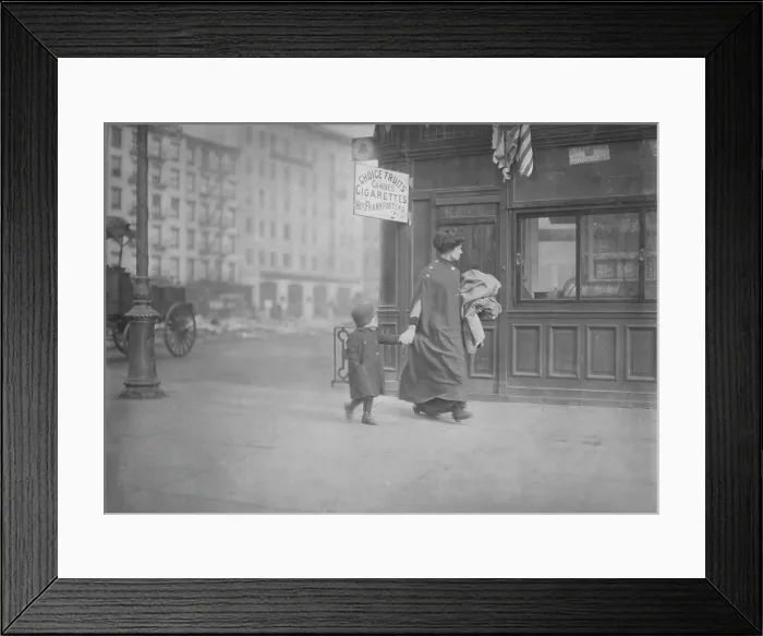 Framed Print : Mother and son carrying homework, near Astor Place, New York City, photograph by Lewis Wickes Hine, February, 1912 Framed Print : Mother and son carrying homework, near Astor Place, New York City, photograph by Lewis Wickes Hine, February, 1912