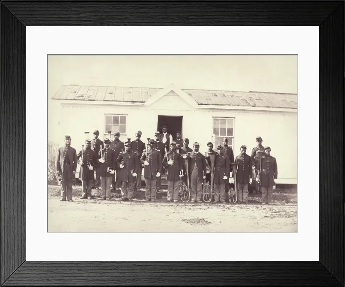 Framed Print : The Civil War, group of 21 African American men holding musical instruments, title: Band of 107th U.S. Colored Infantry, Arlington, Virginia, photograph by William M Framed Print : The Civil War, group of 21 African American men holding musical instruments, title: Band of 107th U.S. Colored Infantry, Arlington, Virginia, photograph by William M